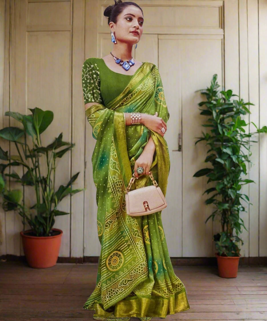 Woman wearing a green bhandej saree for ceremonies