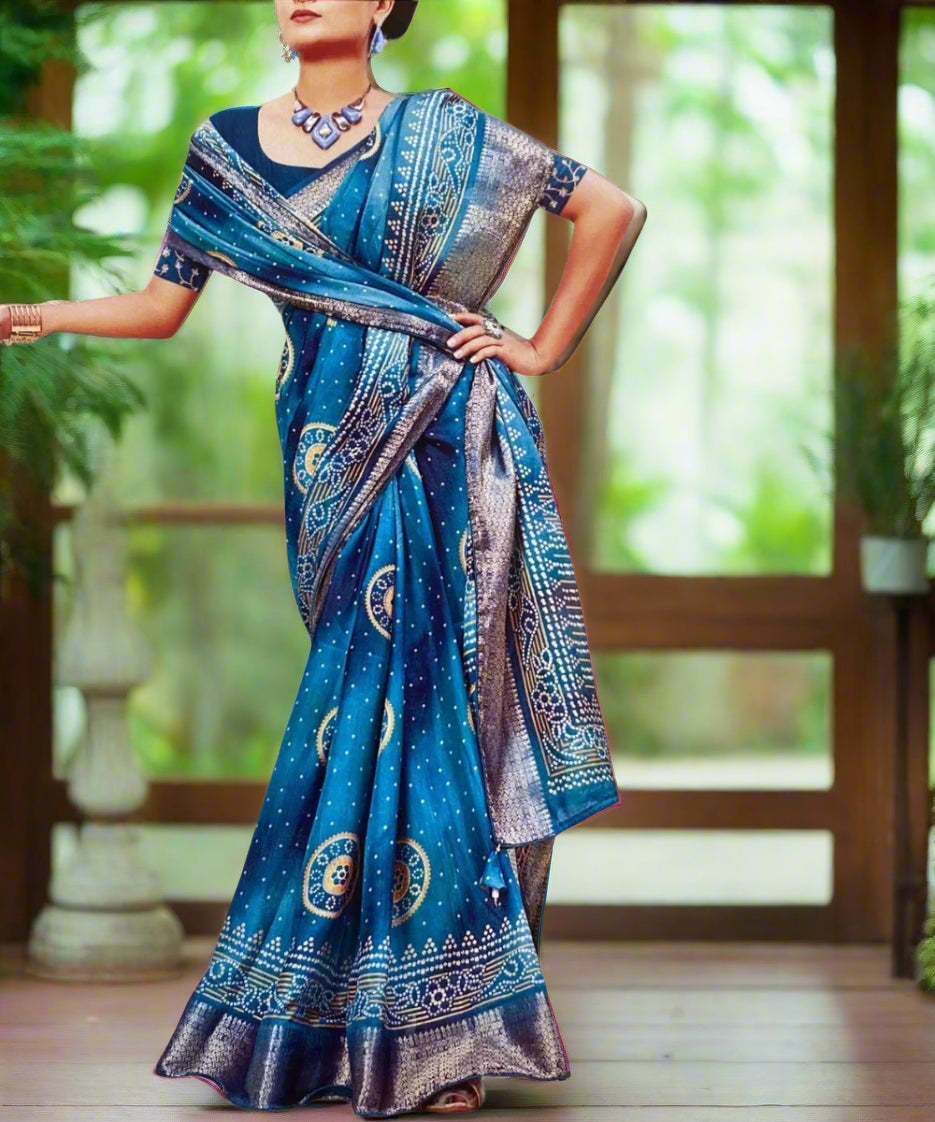 A woman wearing a blue saree with intricate patterns is perfect for wedding ceremonies and festivities.