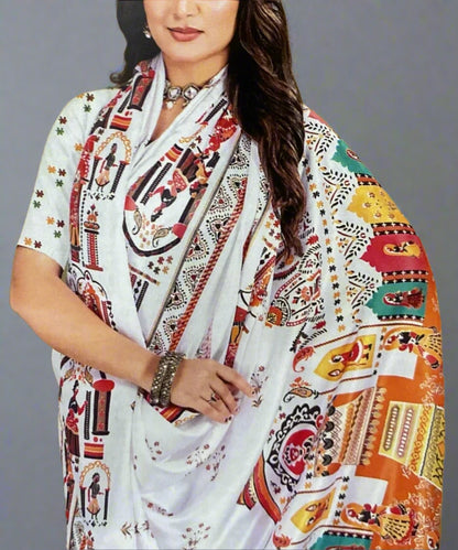 Woman wearing a colorful patterned formal saree in shawl style.