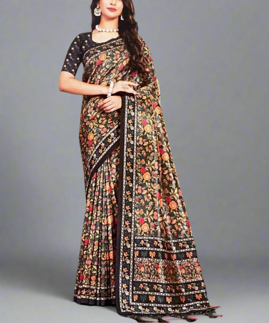 Woman wearing a floral saree with a green background