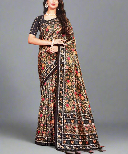 Woman wearing a floral saree with a green background