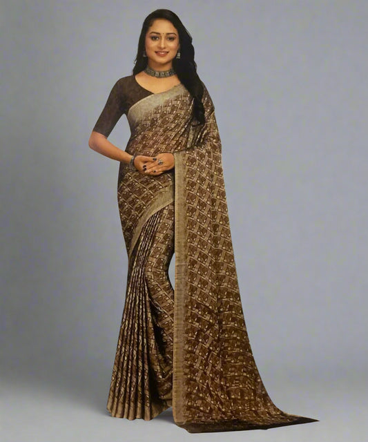 Woman wearing a brown saree with a blouse on a light grey background, perfect for working women.