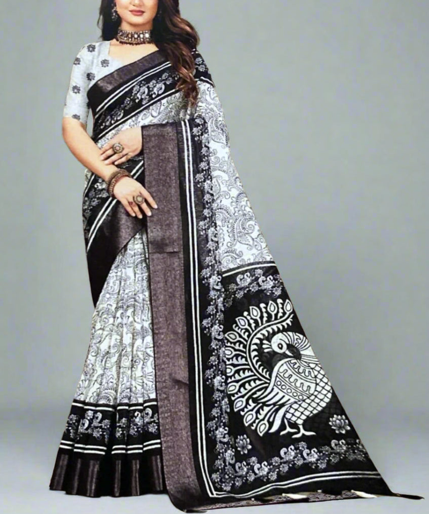 Woman wearing a black and white saree with a pattern on a nice background