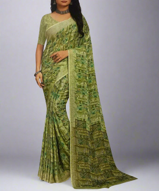 Green patterned saree with a matching blouse for teachers and women in jobs.