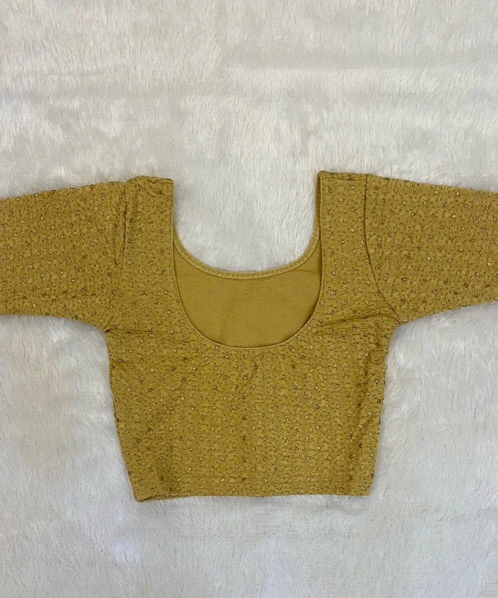 Beige yellow cotton stretchable blouse on a light grey background