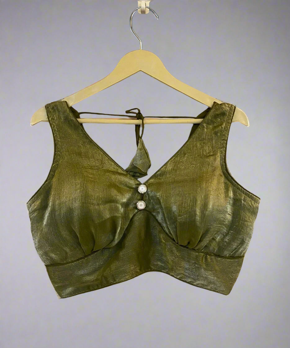 Moss green sleeveless blouse with a deep V-neck and back dori (button) closure, displayed on a hanger.