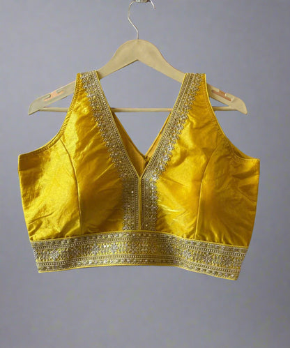 Front side of yellow embroidered blouse