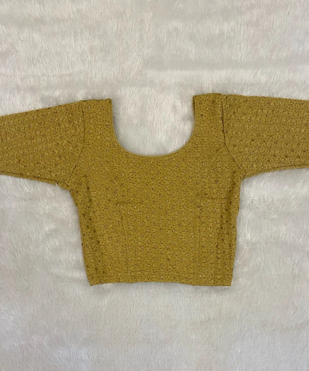 Beige yellow cotton stretchable blouse on a light grey background