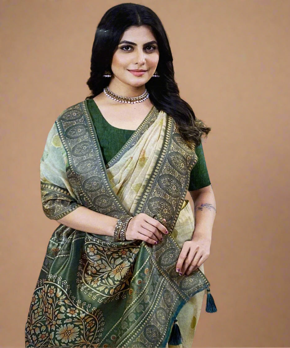 Woman wearing a traditional green and beige saree with a patterned blouse against a brown background