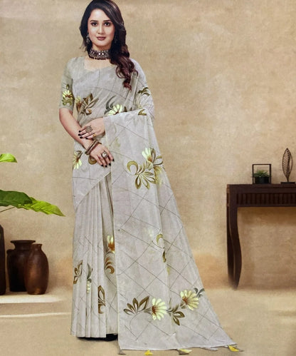 Woman wearing a hand-painted floral saree in a room with decorative elements for diwali