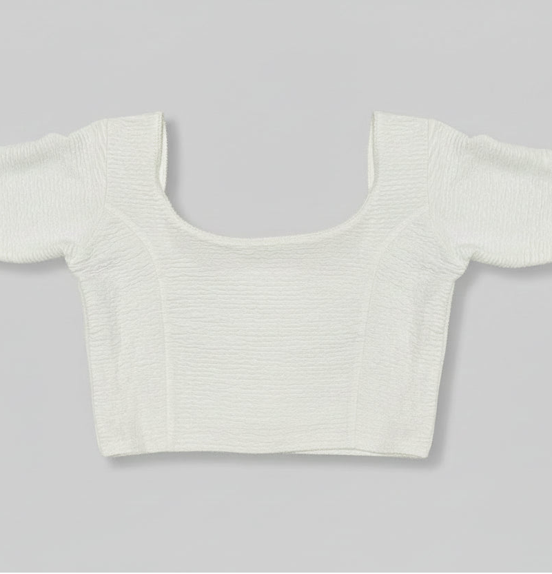White crop top on a gray background