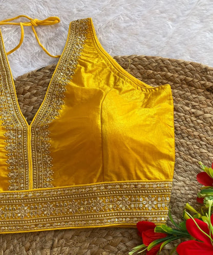 close up photo of Yellow Embroidered Wedding wear Blouse 